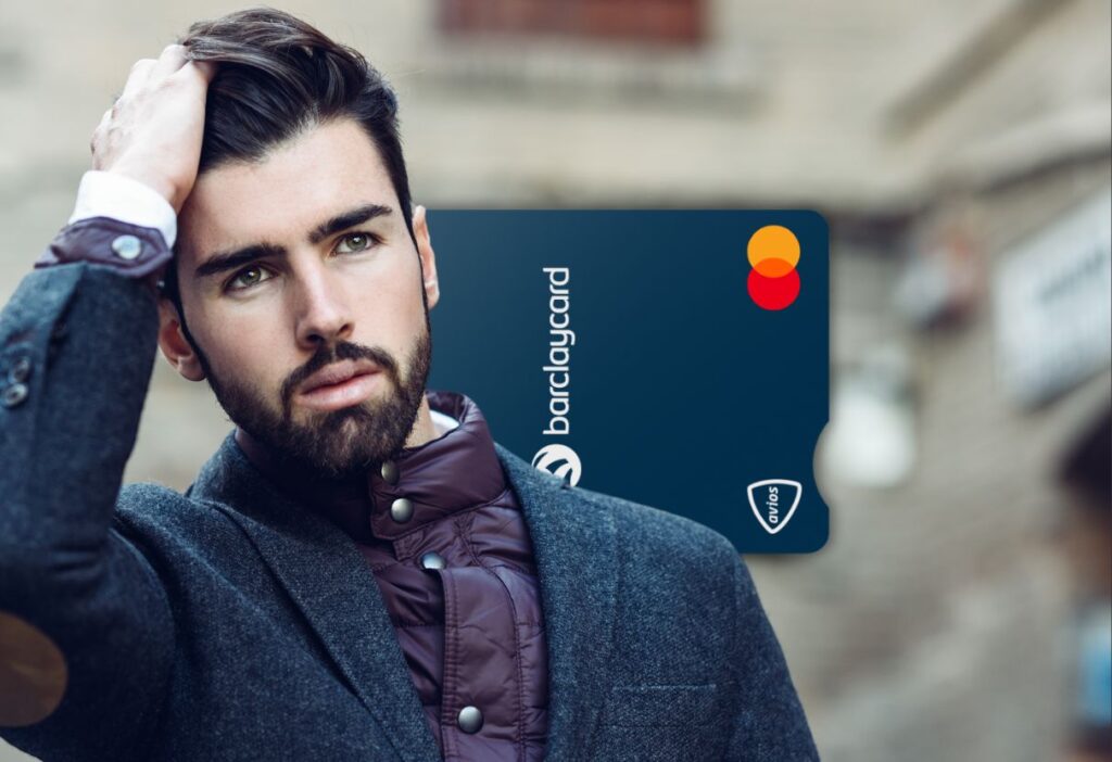 Stylish man in urban surroundings, featuring the Barclaycard Avios credit card, highlighting travel rewards and premium benefits.