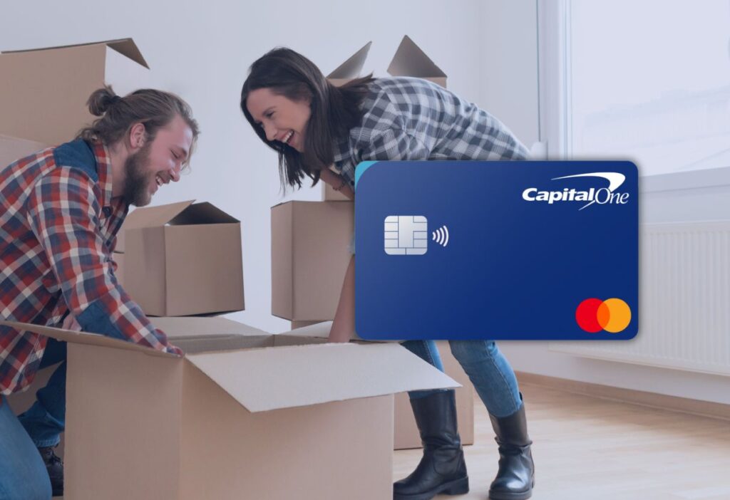 Happy couple unpacking boxes in a new home with a blue Capital One credit card overlay, symbolising financial support for new beginnings.