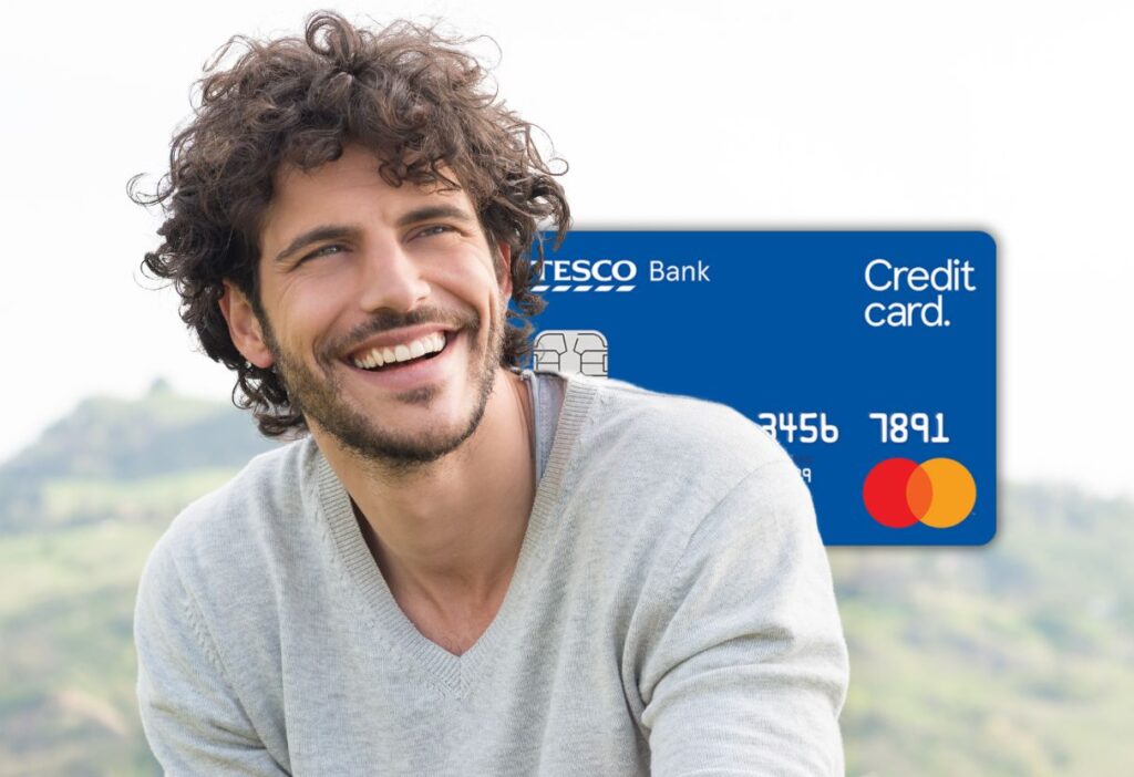 A cheerful man enjoying the benefits of the Tesco Bank Credit Card, perfect for everyday spending and rewards.