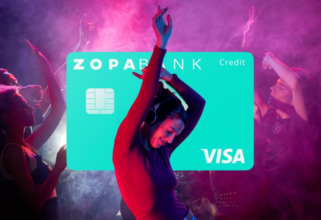 A woman dancing joyfully in a vibrant club scene, with the Zopa Bank Credit Card highlighted in the background, showcasing its modern and energetic appeal.